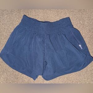 Lululemon, navy shorts.